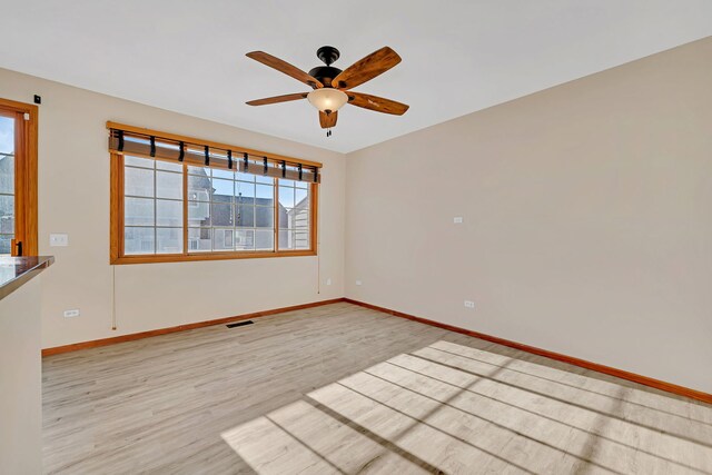 15810 Scotsglen Rd, Orland Park, IL 60462 - empty room with wood finished floors and ceiling fan