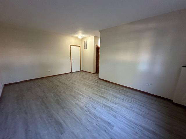 15810 Scotsglen Rd, Orland Park, IL 60462 - unfurnished room with wood finished floors and baseboards
