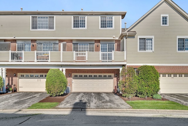 15810 Scotsglen Rd, Orland Park, IL 60462 - multi unit property featuring brick siding, asphalt driveway, and a garage