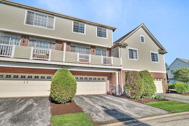 15810 Scotsglen Rd, Orland Park, IL 60462 - view of front of property featuring brick siding, driveway, a balcony, and an attached garage