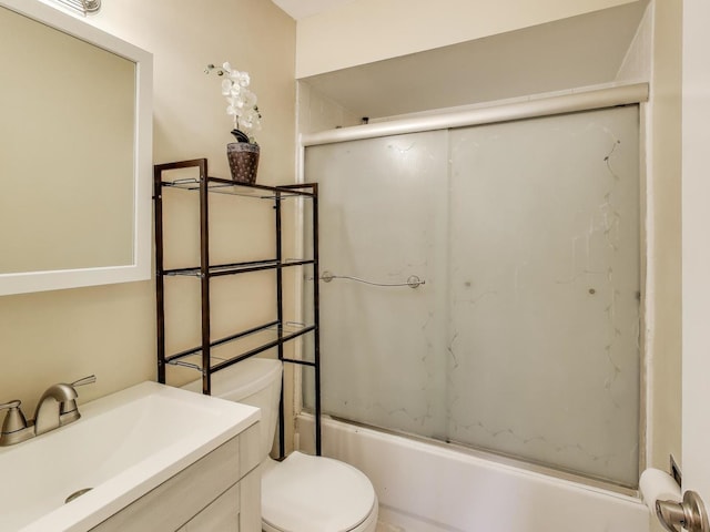 6660 S Brainard Ave Unit 103, Countryside, IL 60525 - bathroom with toilet, combined bath / shower with glass door, and vanity
