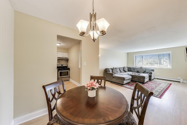 6660 S Brainard Ave Unit 103, Countryside, IL 60525 - dining space with a chandelier, a baseboard radiator, light wood-style floors, and baseboards