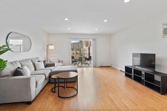 905 Graceland Ave Unit 12, Des Plaines, IL 60016 - living room with light wood-type flooring, a baseboard heating unit, recessed lighting, and baseboards