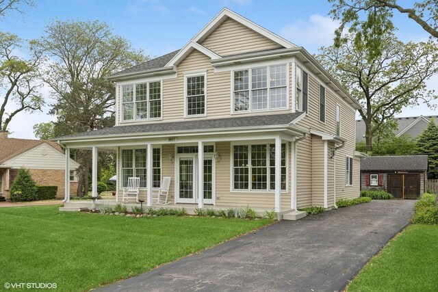 34017 N Prospect Dr, Grayslake, IL 60030 - view of front of property with a porch and a front lawn