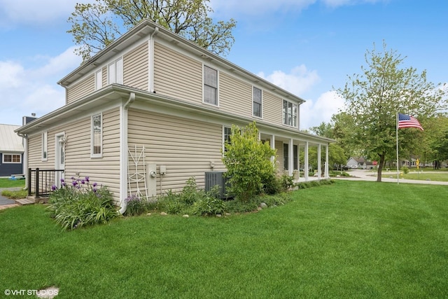34017 N Prospect Dr, Grayslake, IL 60030 - view of side of home featuring a lawn and cooling unit