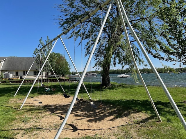 34017 N Prospect Dr, Grayslake, IL 60030 - view of jungle gym with a water view and a yard