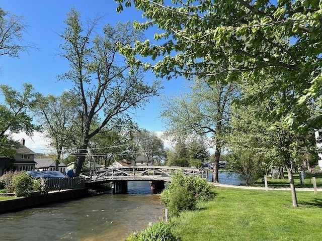 34017 N Prospect Dr, Grayslake, IL 60030 - dock area with a lawn and a water view