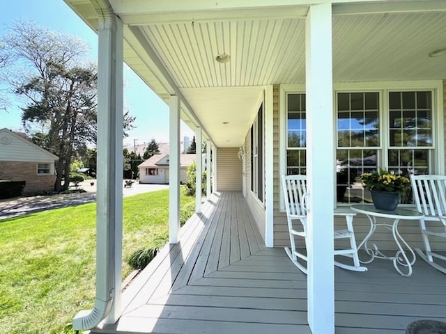 34017 N Prospect Dr, Grayslake, IL 60030 - wooden porch featuring a lawn