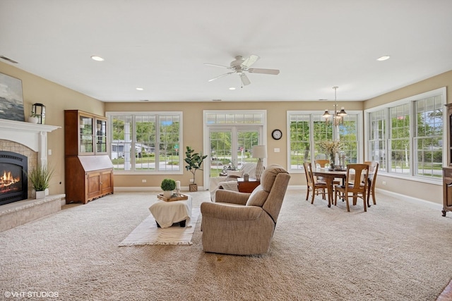 34017 N Prospect Dr, Grayslake, IL 60030 - carpeted living area featuring baseboards, healthy amount of natural light, a glass covered fireplace, ceiling fan, and recessed lighting