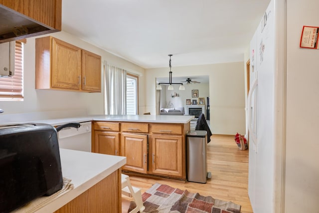 959 Campbell Dr, Naperville, IL 60563 - kitchen with white appliances, light wood-type flooring, a ceiling fan, light countertops, and a peninsula