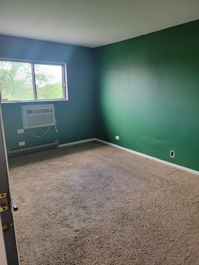 1140 Cedar St Unit 3A, Glendale Heights, IL 60139 - carpeted spare room featuring a wall unit AC, a baseboard radiator, and baseboards