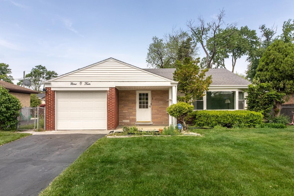 904 Parkview Ln, Des Plaines, IL 60016 - ranch-style home featuring asphalt driveway, a garage, and a shingled roof