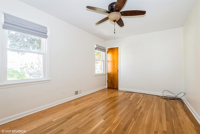 2852 W 84th Pl, Chicago, IL 60652 - unfurnished room with light wood-type flooring, healthy amount of natural light, baseboards, and ceiling fan