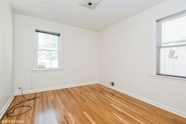 2852 W 84th Pl, Chicago, IL 60652 - spare room featuring light wood finished floors and baseboards
