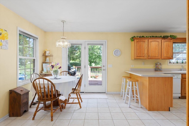 2697 Creekside Ln, Morris, IL 60450 - dining room with a chandelier, baseboards, and light tile patterned flooring