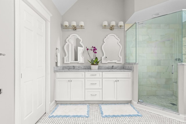 1100 Forest Ave, Wilmette, IL 60091 - bathroom with a shower stall, vaulted ceiling, double vanity, and tile patterned flooring