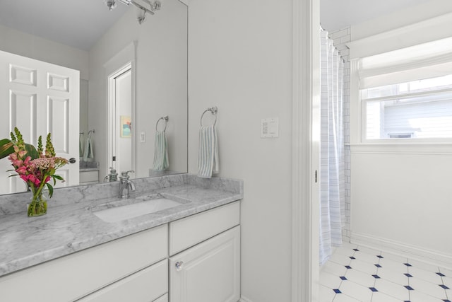 1100 Forest Ave, Wilmette, IL 60091 - bathroom featuring vanity, baseboards, and a shower with curtain