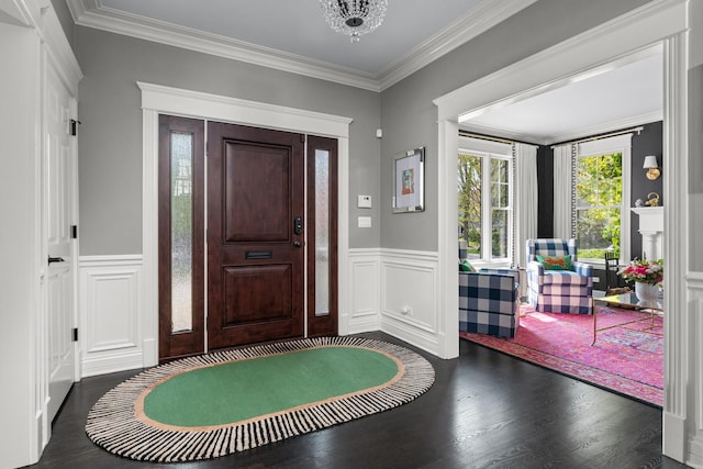 1100 Forest Ave, Wilmette, IL 60091 - foyer entrance with wood finished floors, a wainscoted wall, ornamental molding, and a decorative wall