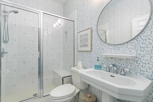 1100 Forest Ave, Wilmette, IL 60091 - bathroom featuring wallpapered walls, a shower stall, toilet, and a sink