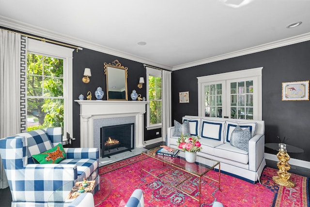 1100 Forest Ave, Wilmette, IL 60091 - living area featuring a warm lit fireplace, crown molding, and baseboards