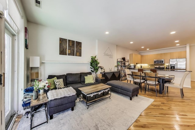 2251 W Saint Paul Ave Unit 2D, Chicago, IL 60647 - living room with recessed lighting and light wood finished floors