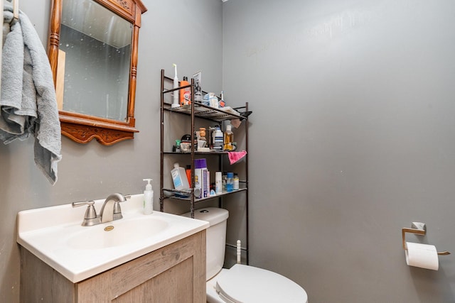 403 W School St, Plano, IL 60545 - half bathroom featuring toilet and vanity