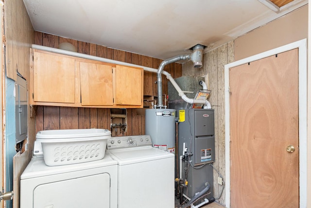 403 W School St, Plano, IL 60545 - washroom with washer and dryer, cabinet space, water heater, and electric panel
