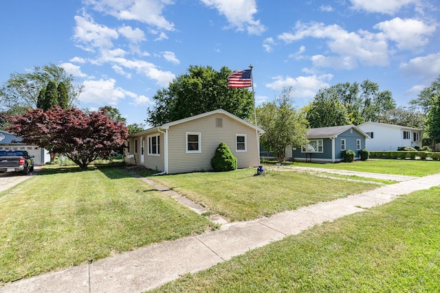 403 W School St, Plano, IL 60545 - view of front facade with a front lawn
