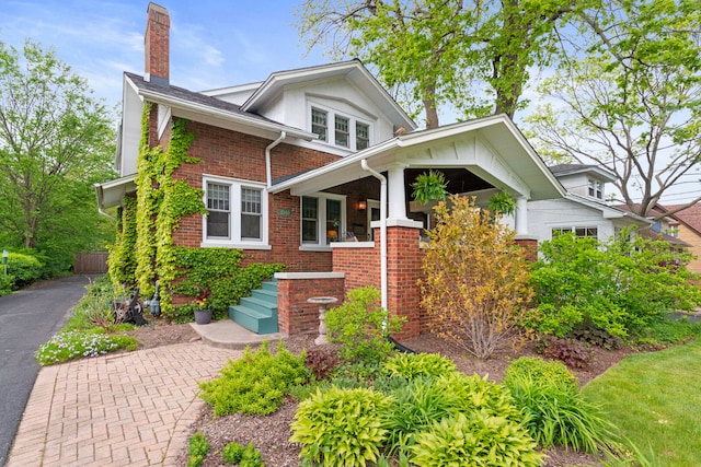 1040 Shermer Rd, Northbrook, IL 60062 - view of front of property with a chimney and brick siding