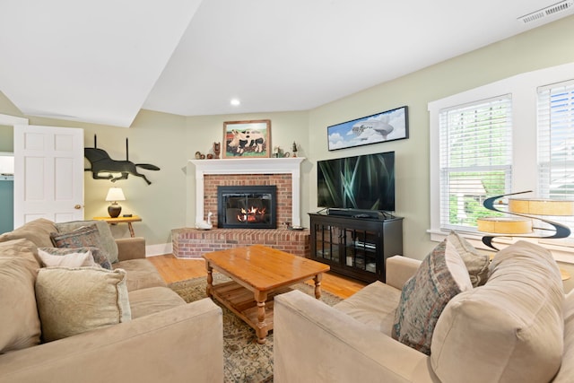 1040 Shermer Rd, Northbrook, IL 60062 - living room with wood finished floors, a fireplace, recessed lighting, and baseboards