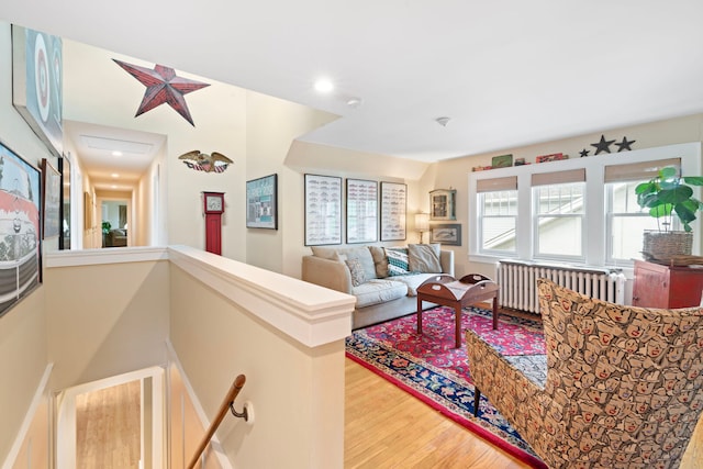 1040 Shermer Rd, Northbrook, IL 60062 - living area featuring radiator, wood finished floors, and recessed lighting