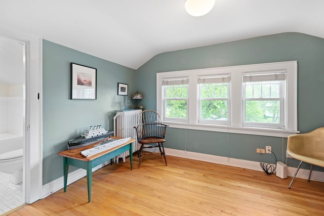 1040 Shermer Rd, Northbrook, IL 60062 - living area with lofted ceiling, light wood-type flooring, and baseboards