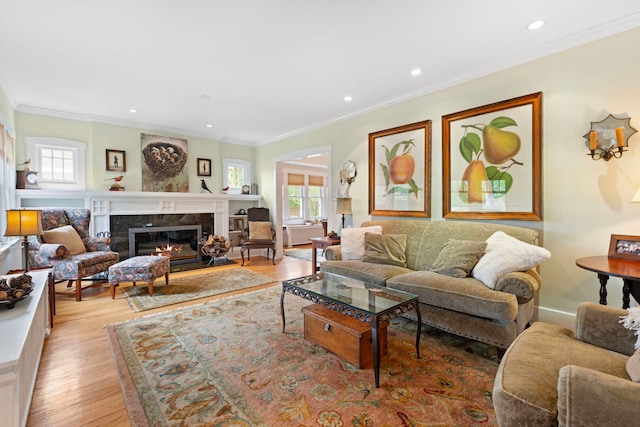 1040 Shermer Rd, Northbrook, IL 60062 - living room featuring a fireplace, crown molding, wood finished floors, and recessed lighting