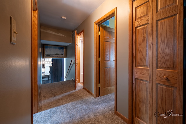 2031 W Winchester Dr, Freeport, IL 61032 - corridor with an upstairs landing, carpet, and baseboards