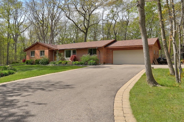 2030 Burke Dr, Winthrop Harbor, IL 60096 - single story home featuring brick siding, an attached garage, asphalt driveway, a front lawn, and roof with shingles
