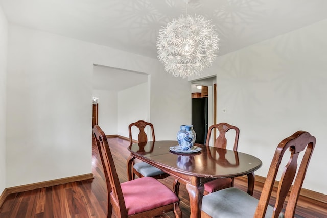 2030 Burke Dr, Winthrop Harbor, IL 60096 - dining room featuring baseboards, a chandelier, and wood finished floors