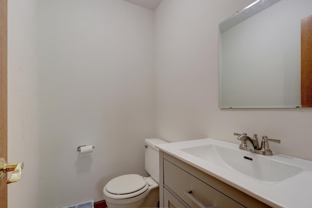 2030 Burke Dr, Winthrop Harbor, IL 60096 - half bathroom featuring toilet and vanity