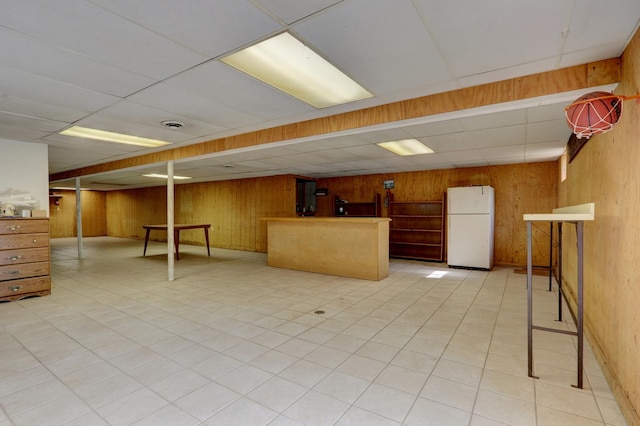 2030 Burke Dr, Winthrop Harbor, IL 60096 - finished basement with freestanding refrigerator, a paneled ceiling, and wooden walls