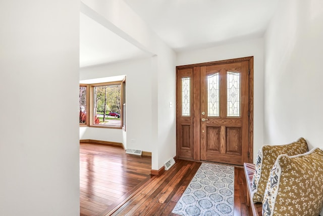2030 Burke Dr, Winthrop Harbor, IL 60096 - foyer entrance with dark wood-type flooring and baseboards