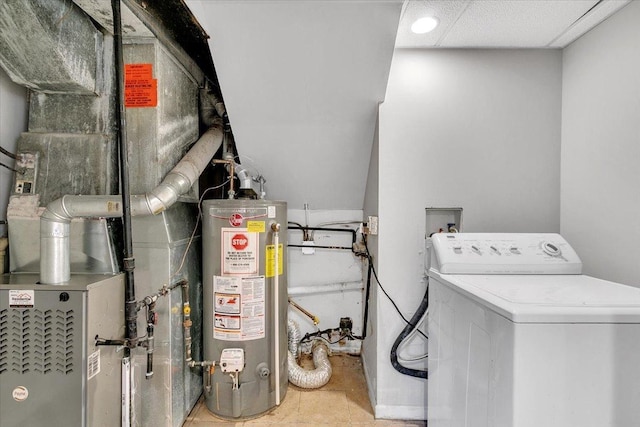 utilities featuring washer / dryer, water heater, and heating unit