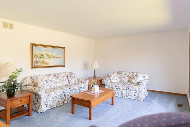 living room with carpet flooring and baseboards