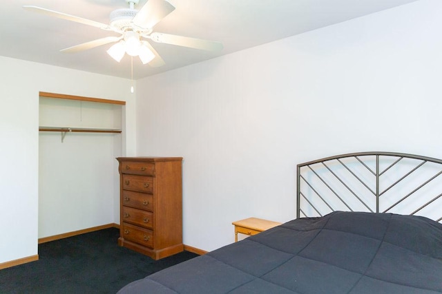 bedroom featuring carpet floors, baseboards, a closet, and ceiling fan