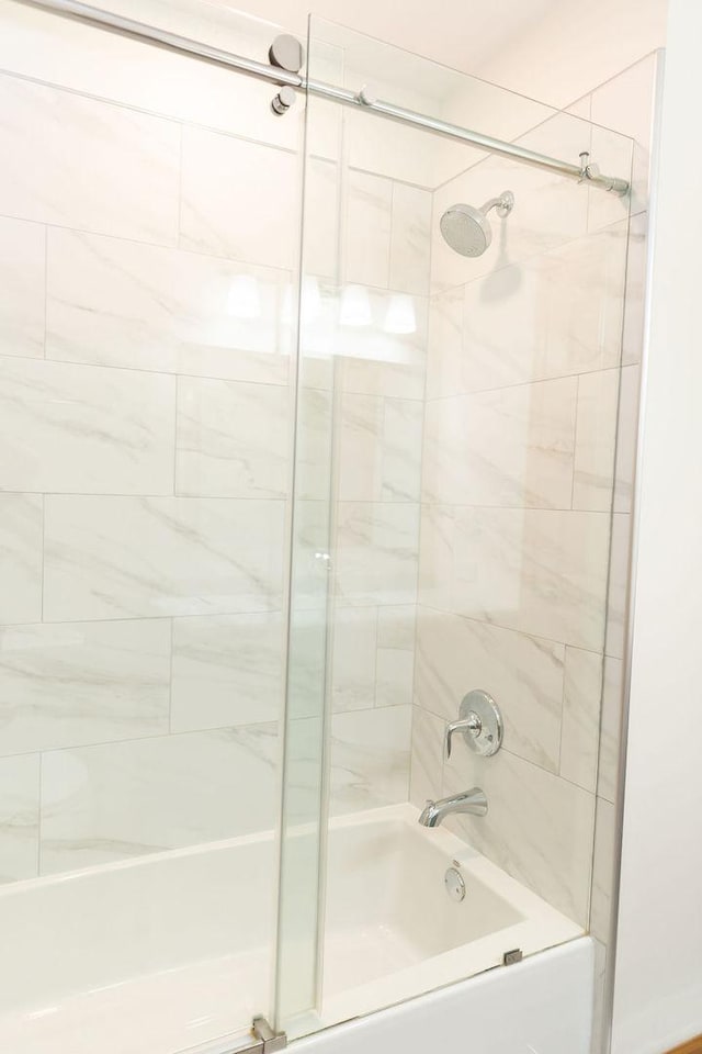 bathroom featuring enclosed tub / shower combo