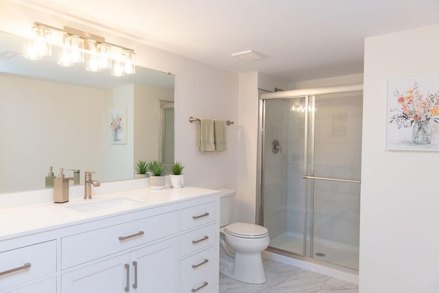 bathroom with a stall shower, marble look tile flooring, toilet, and vanity