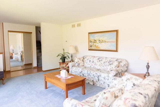 living area featuring carpet floors