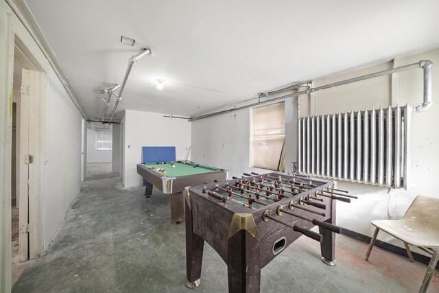 5815 W Roosevelt Rd, Cicero, IL 60804 - rec room with concrete floors, radiator heating unit, and billiards table