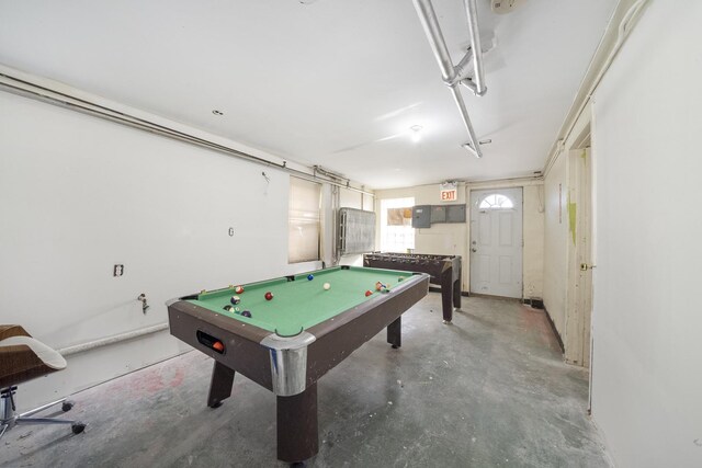 5815 W Roosevelt Rd, Cicero, IL 60804 - rec room with concrete flooring, a garage, pool table, and electric panel