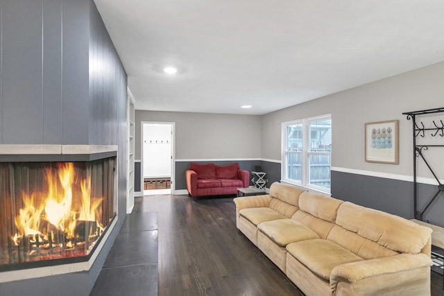2S579 Partridge Rd, Batavia, IL 60510 - living room with a multi sided fireplace, dark wood-type flooring, recessed lighting, and baseboards