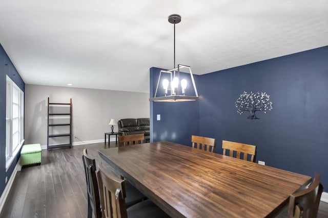2S579 Partridge Rd, Batavia, IL 60510 - dining room featuring a chandelier, dark wood-style floors, and baseboards