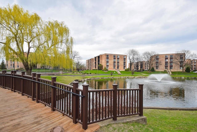 1103 S Hunt Club Dr Unit 127, Mount Prospect, IL 60056 - dock with a water view and a lawn